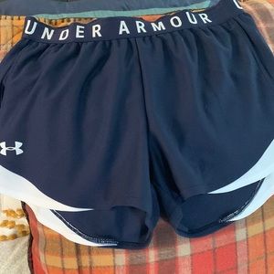 Under Armour Navy and White shorts. Size Medium.  Great condition!
